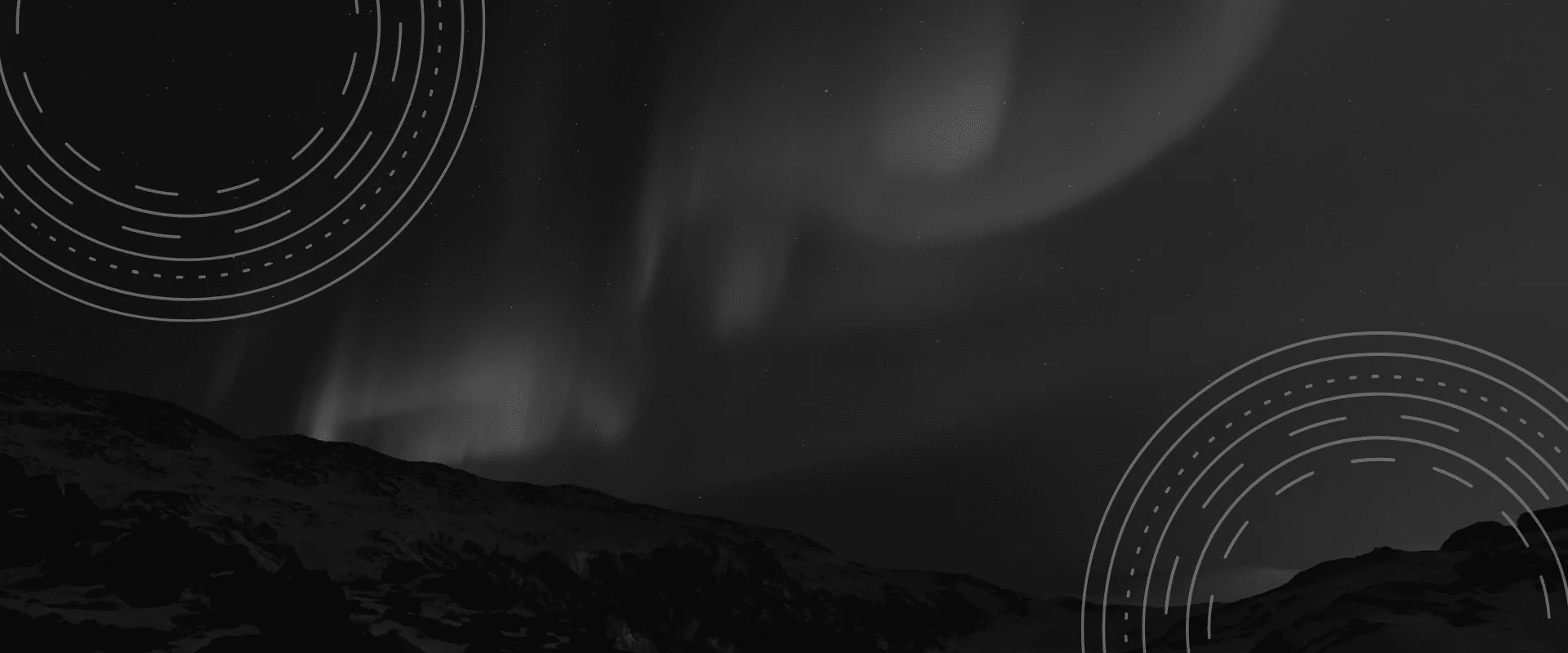 Monochrome night landscape with faint aurora over mountain silhouettes, featuring a starry sky and circular tech-style graphic overlays in the top-left and bottom-right corners.